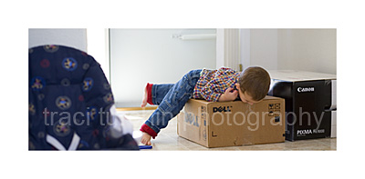 little boy with box