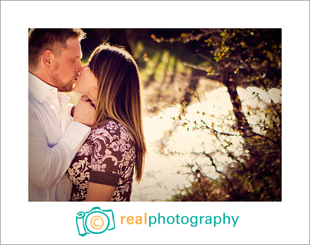 engagement portrait kiss