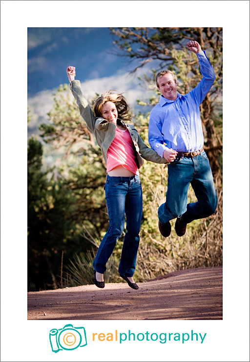 jumping engagement portrait