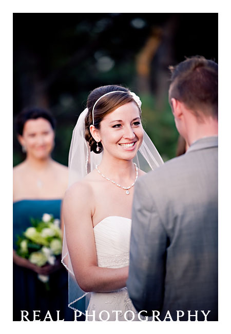bride smiles during ceremony