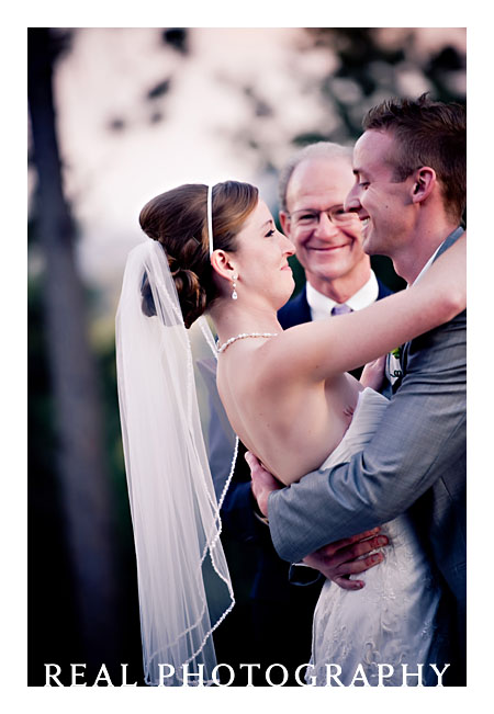 bride and groom first kiss