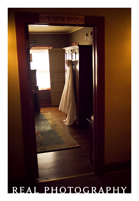 dress hanging in room
