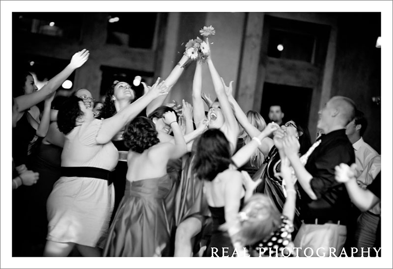 bride bouquet toss wedding photo