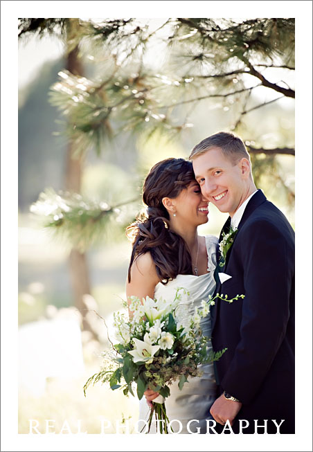 bride and groom portrait lodge at cathedral pines wedding